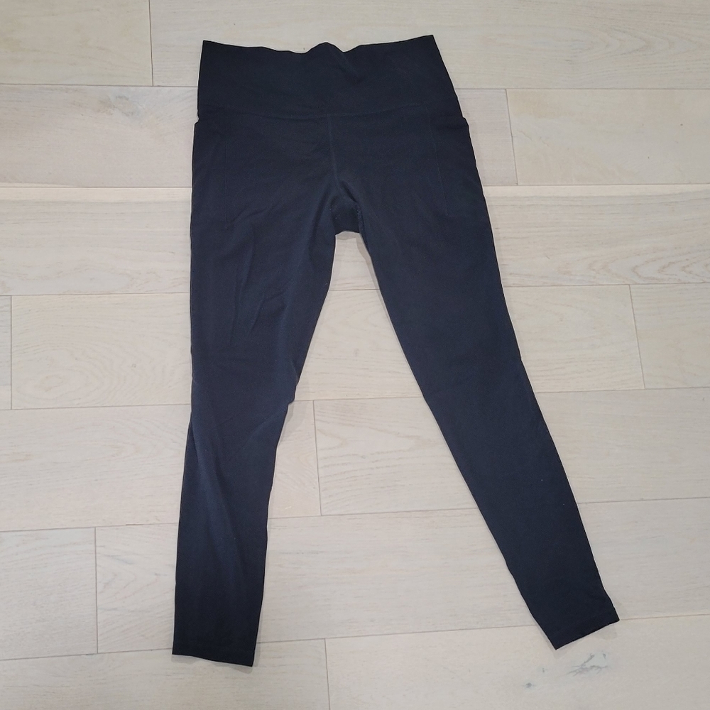 Athleta Salutation Stash Pocket II tight Large